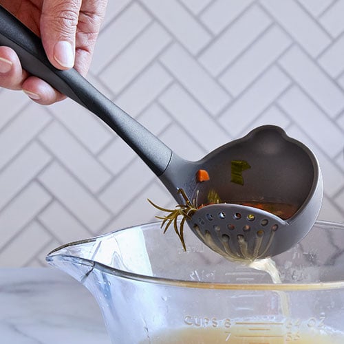 100682-1-lg.jpg Silicone Straining Ladle - Image 1
